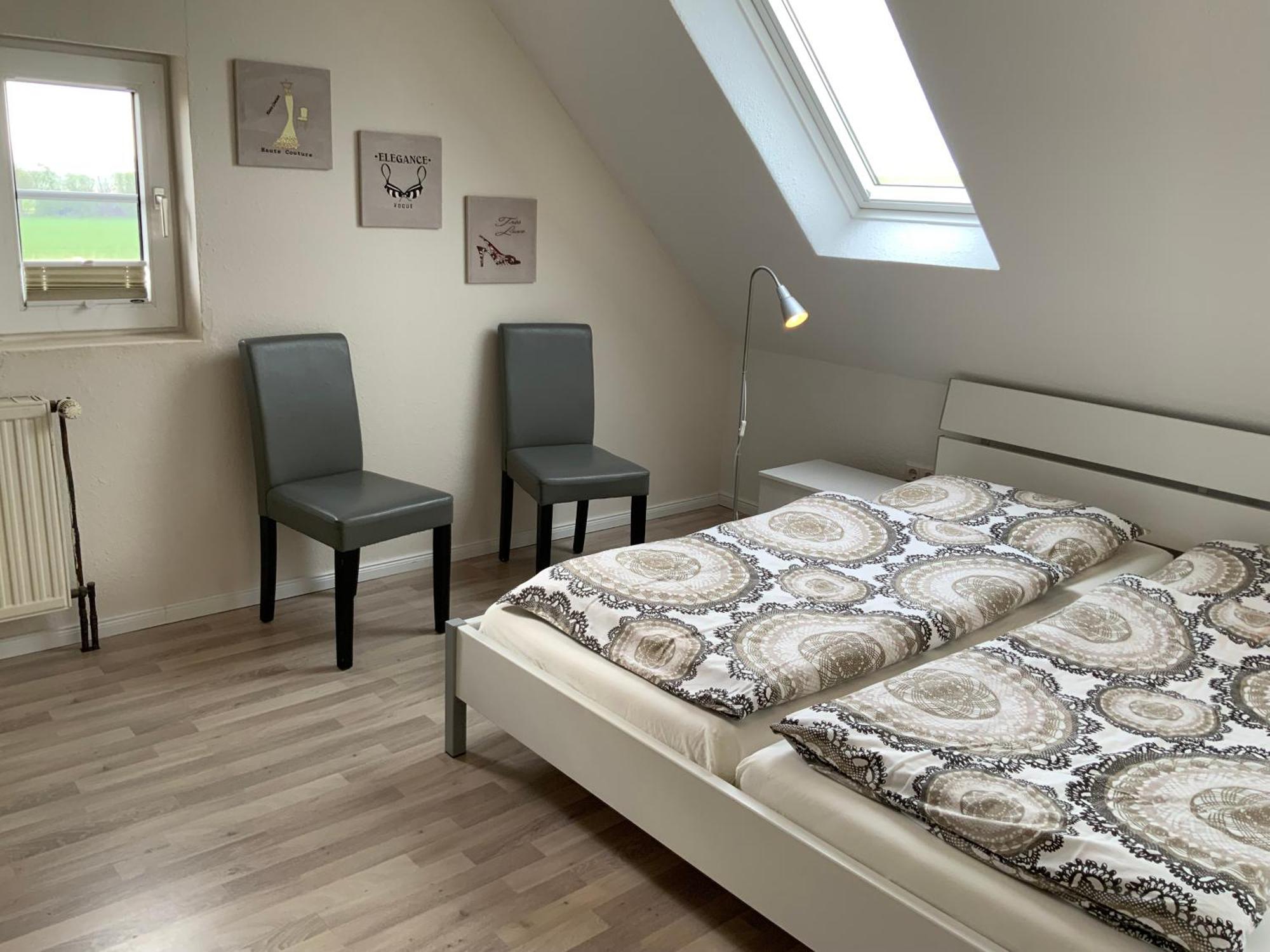 Ferienwohnungen Zollhaus Utlandshoern ノルデン 部屋 写真
